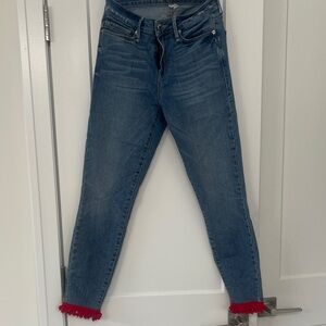 Good American Mid-Blue Ankle Jeans with Red Pom-Hem